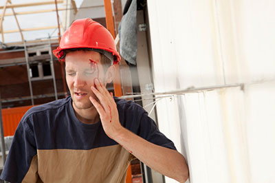 image of man being injured at work